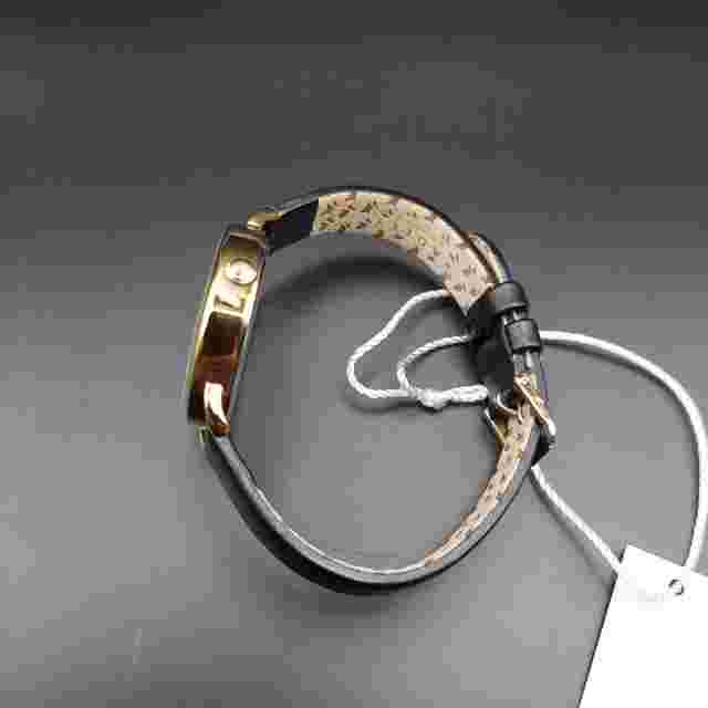 Radley watch with green stone bracelet