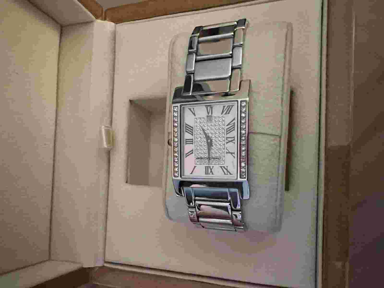 Charles Jourdan Luxury Diamond women’s watch; Swiss Made; Quartz Bezel.