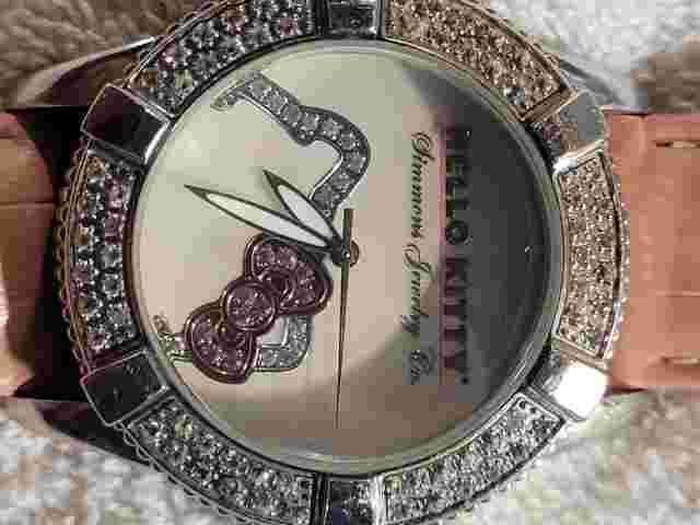 Sanrio Hello Kitty Simmons designer watch crystal accent bezel MoP dial 40mm 3m