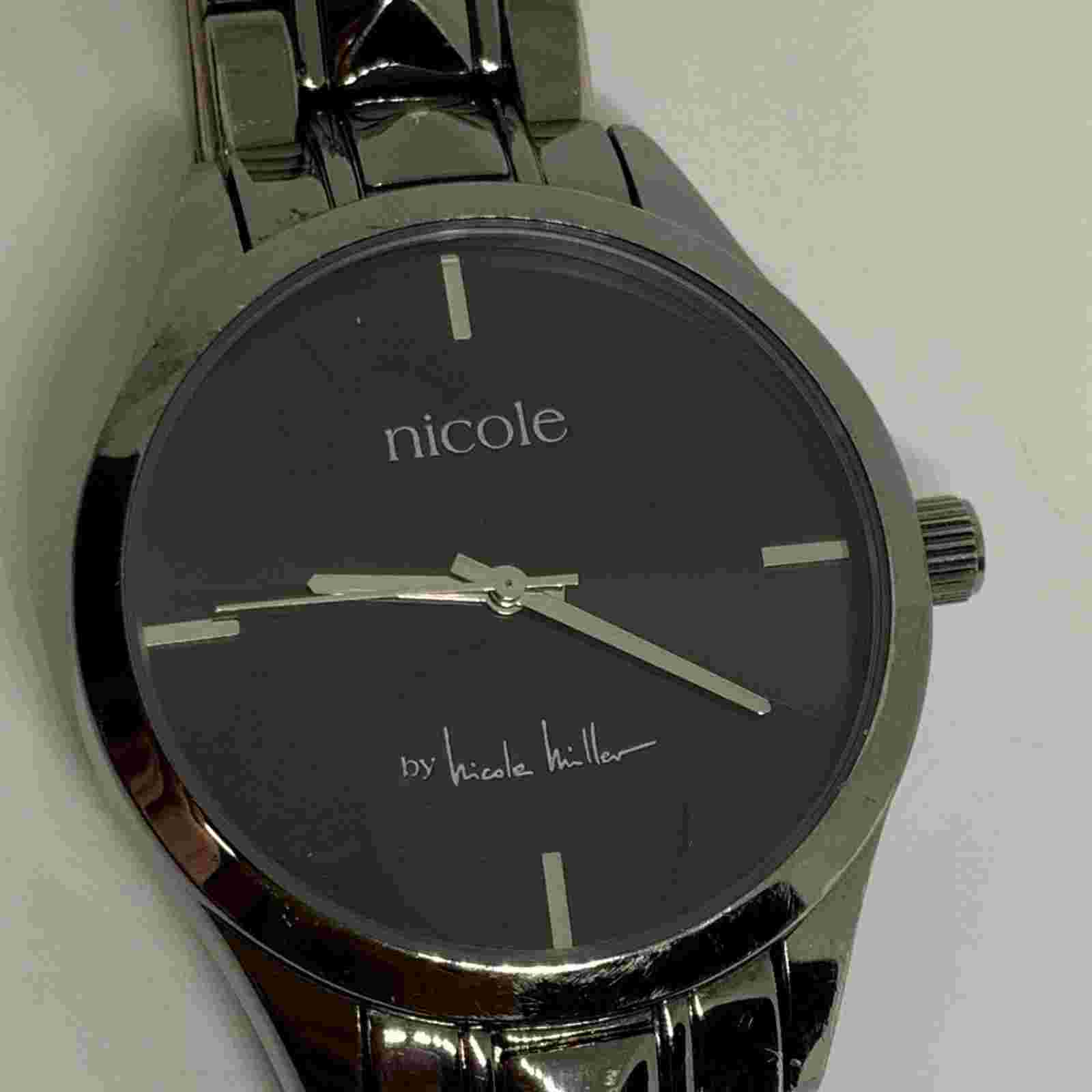 Nicole Miller unisex Watch Black tone dial Quartz 37mm Case bracelet running