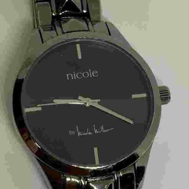 Nicole Miller unisex Watch Black tone dial Quartz 37mm Case bracelet running