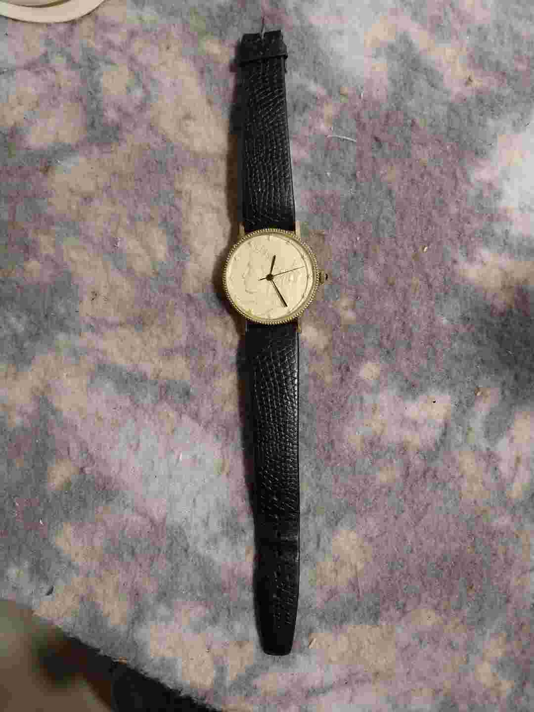 Lady liberty head gold watch