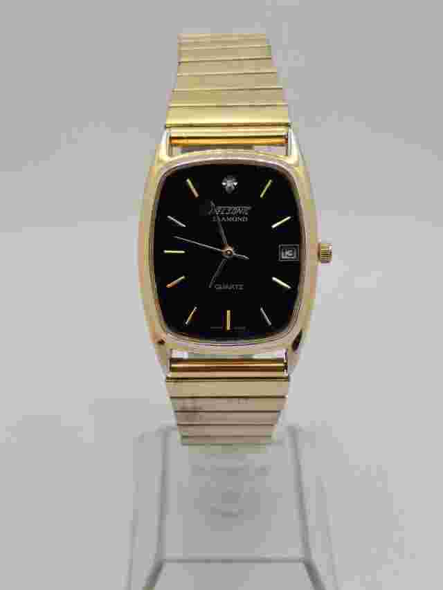 Vintage 80s NELSONIC Diamond Mens 37mm Quartz Watch Date Gold Case Black Dial