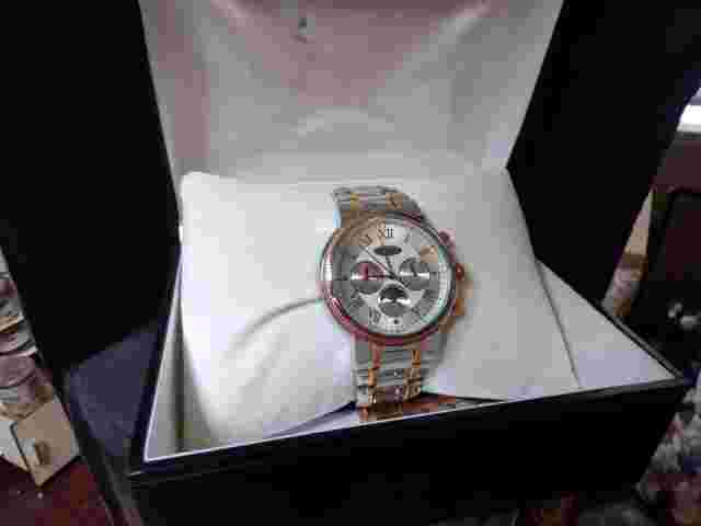 Romilly men's stainless steel auto movement watch, New in box