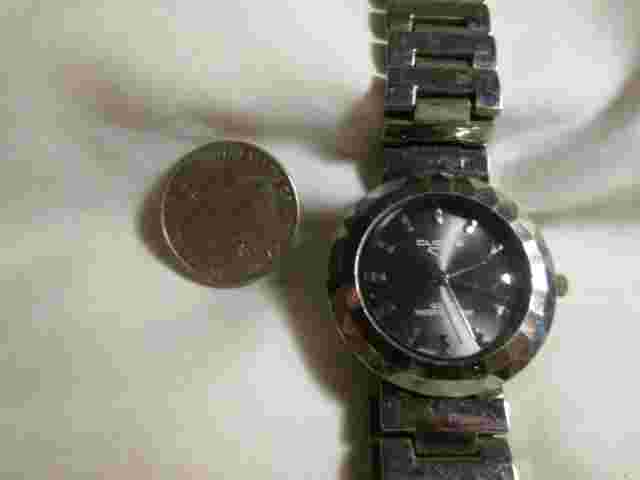 CLIQUE  WOMAN'S WRISTWATCH METAL BAND new battery