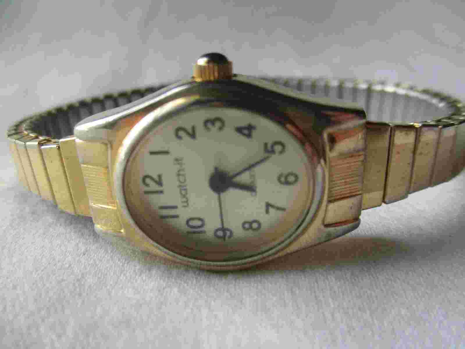 Watch It Analog Wristwatch Gold Tone Expansion Band Oval Shaped Face