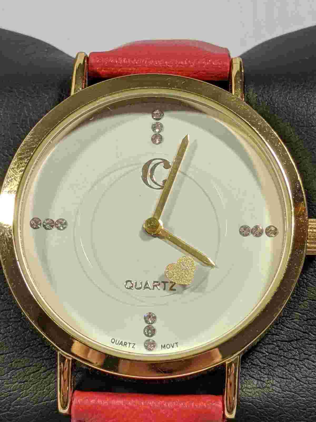 Charming Charlie Gold Tone Round White Face Floating Heart Second Hand Watch
