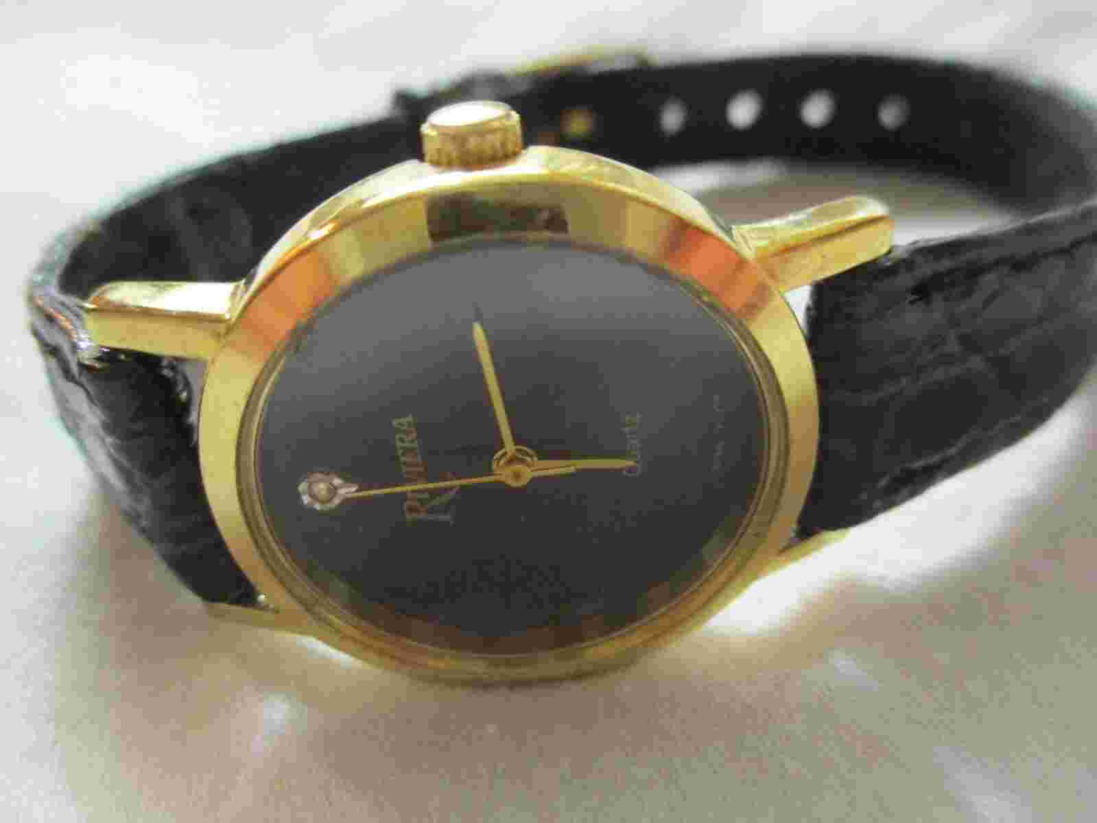 Riviera Wristwatch Black Buckle Band Round Face Gold Toned Simple