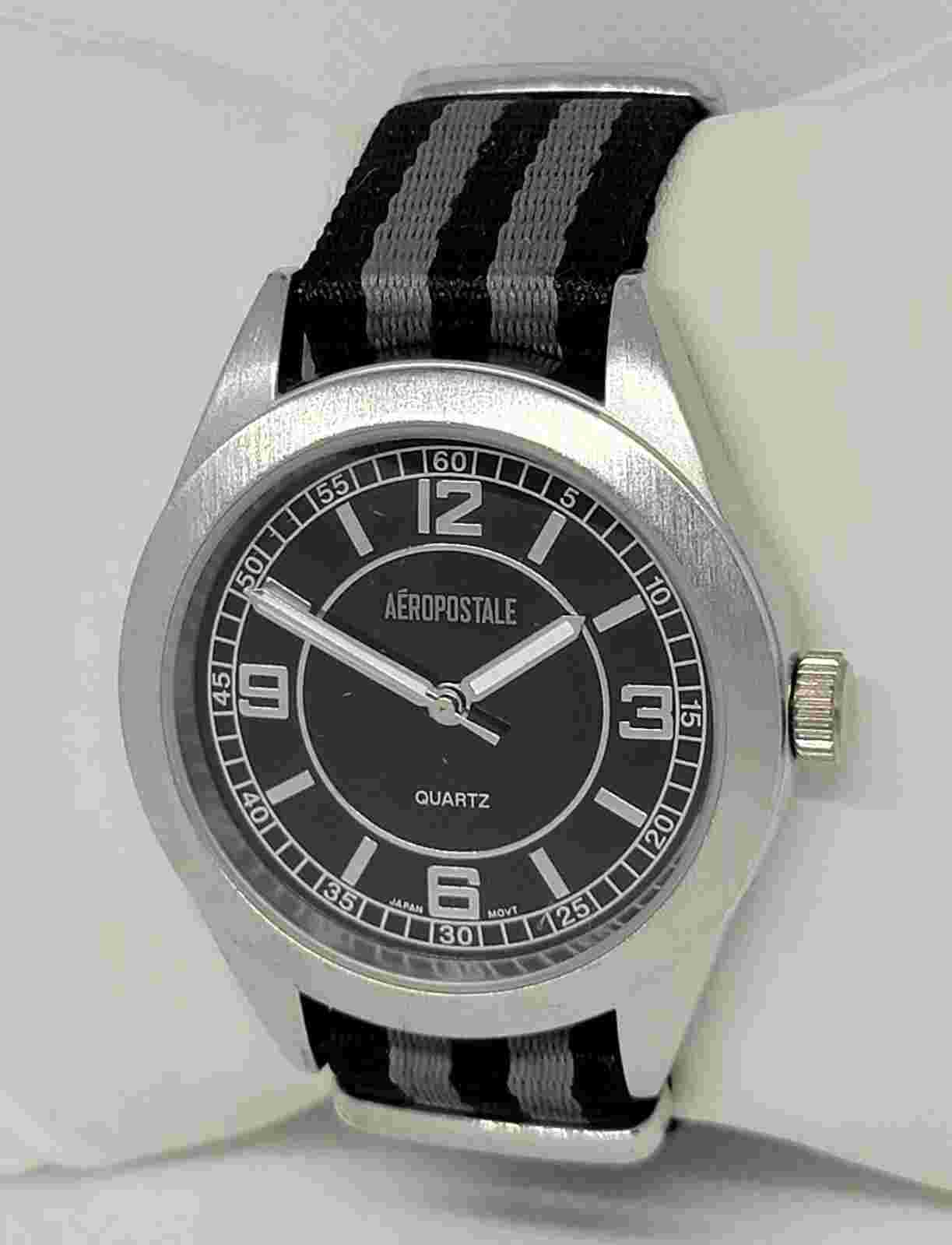 Mens Aeropostale Silver Tone Black Dial Gray Black Nylon Strap Analog Watch E7