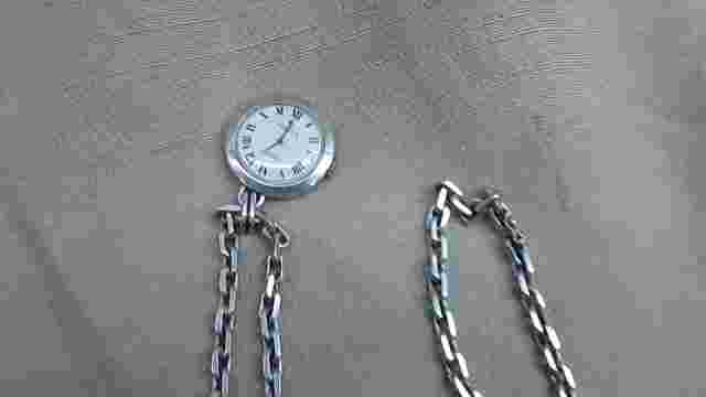 TRESSA PENDANT watch, silver with Roman numerals. Brand: TRESSA, 17 Jewels