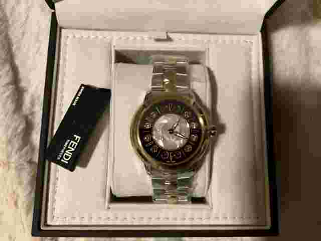 Fendi IShine woman's stainless steel watch, 18 Kt gold plated, mother of pearl