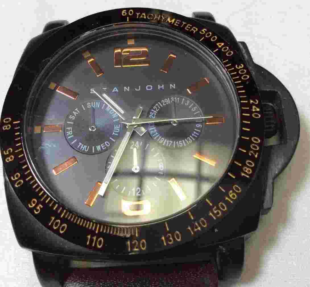 Large Sean John mens watch, back shows age / wear, needs a new strap - M1946
