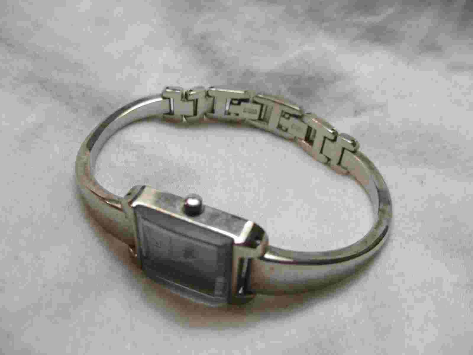 Nine & Company Analog Wristwatch with a Cuff Band