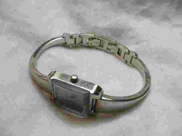 Nine & Company Analog Wristwatch with a Cuff Band