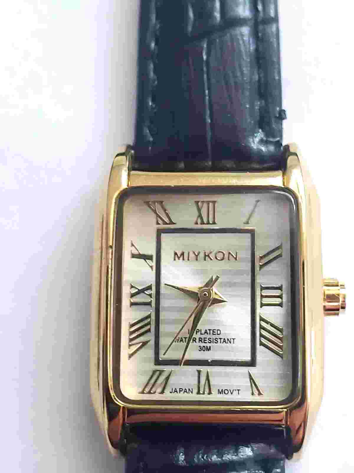 Miykon Woman watch rectangle IP plated black leather, seal on back, new battery