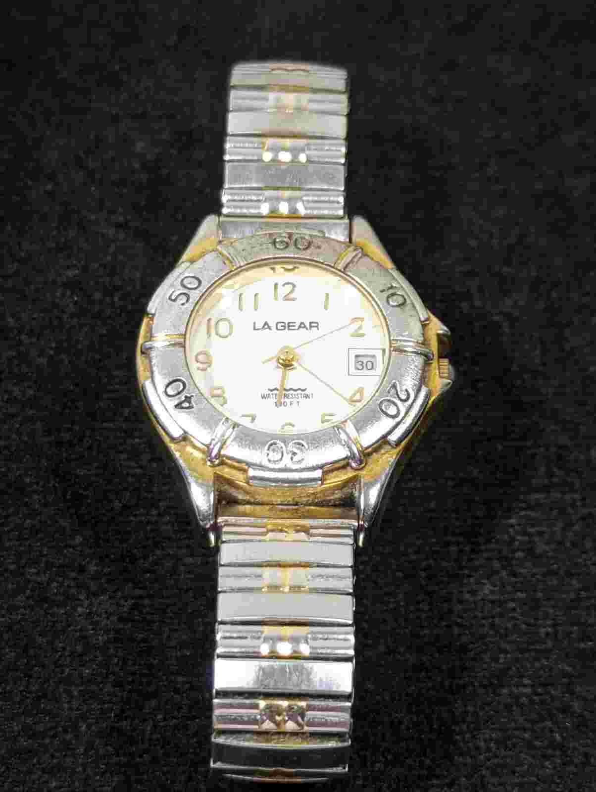 LA Gear White Dial Round Silver Tone Case Stainless Steel Stretch Band Watch