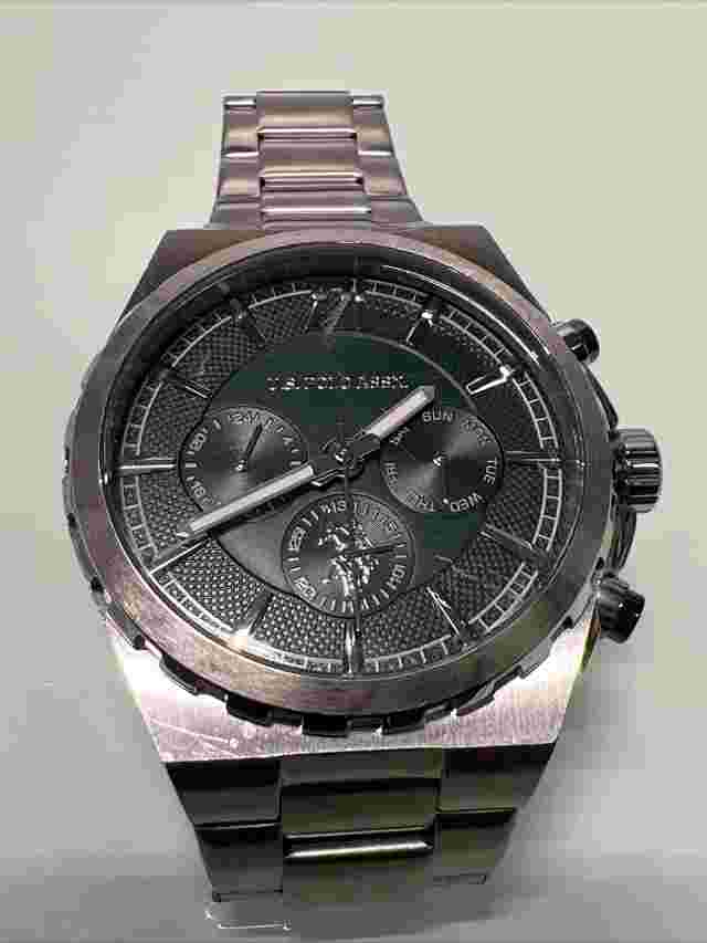 US Polo Assn Silver Tone Dial Round Case Two Tone Stainless Steel Band Watch.
