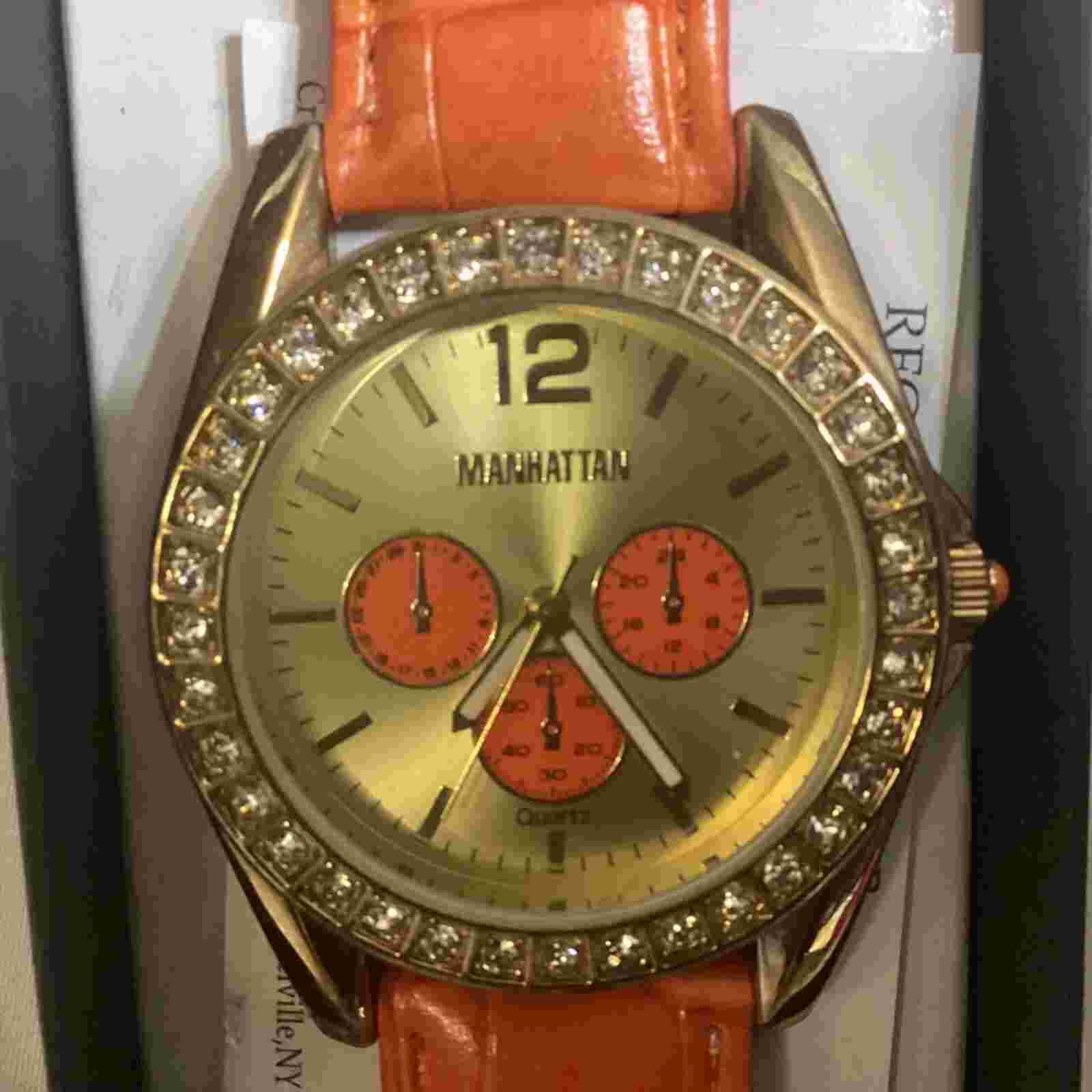 Manhattan by Croton Ladies Watch.Stainless Steel back. Orange. New