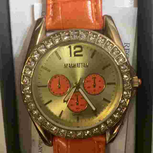 Manhattan by Croton Ladies Watch.Stainless Steel back. Orange. New