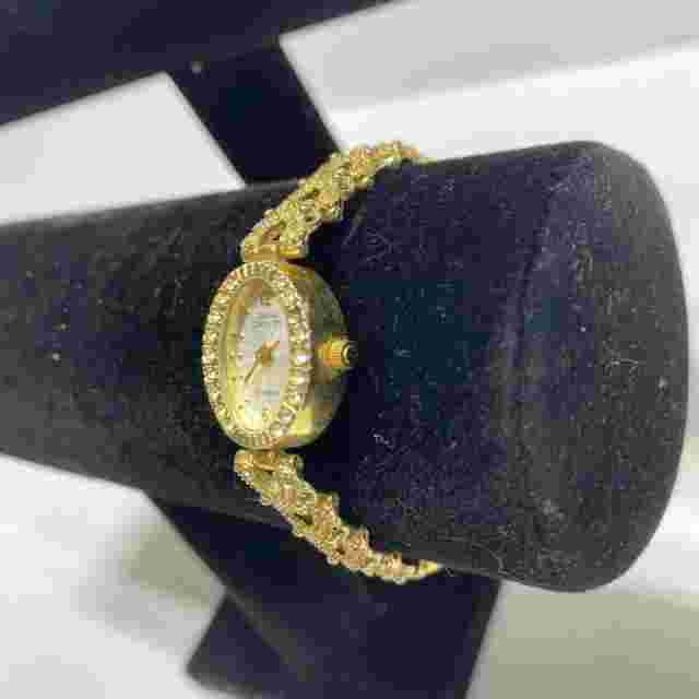 VINTAGE SARAH COVENTRY GOLD TONE DIAMOND ACCENT WATCH