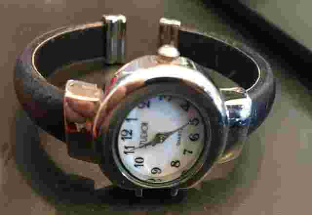 Woman's Studio Watch, Bracelet Style Silver Tone with Black leather Wrapped Brac