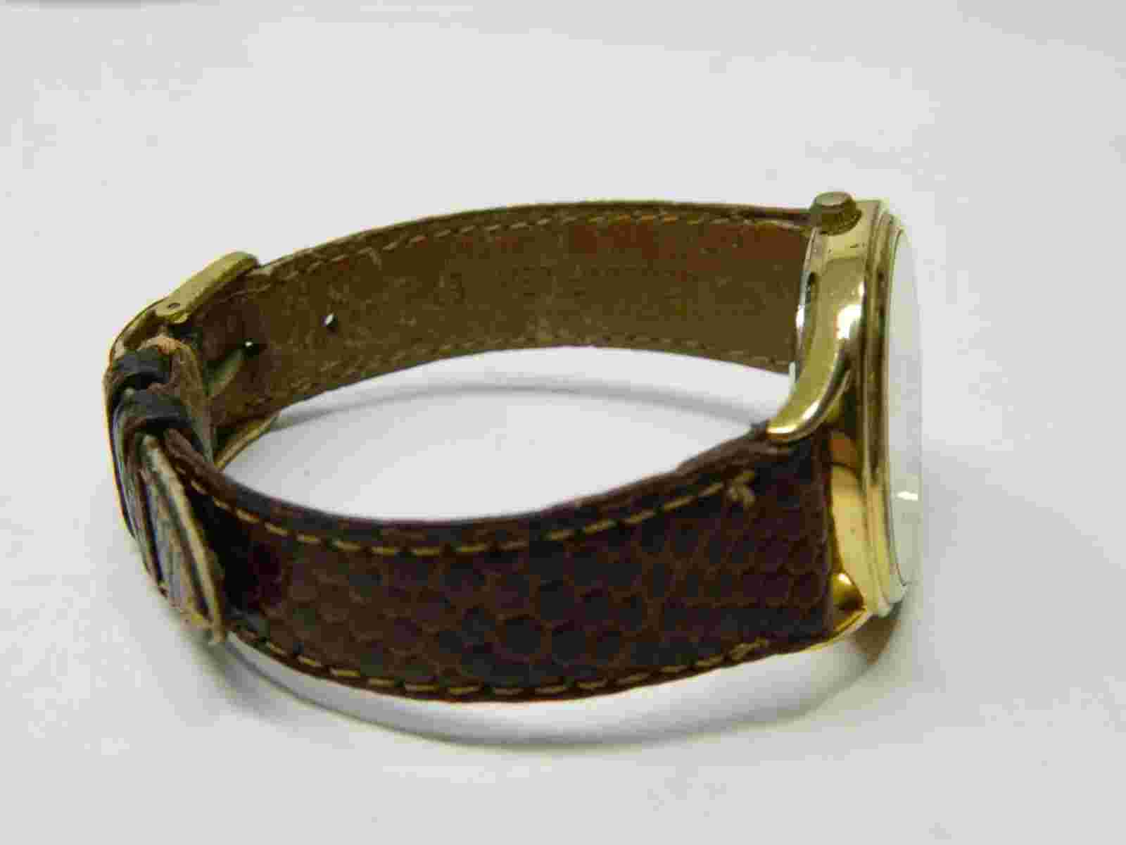 Gold tone Face brown leather band PEUGEOT Lady's wristwatch/watch