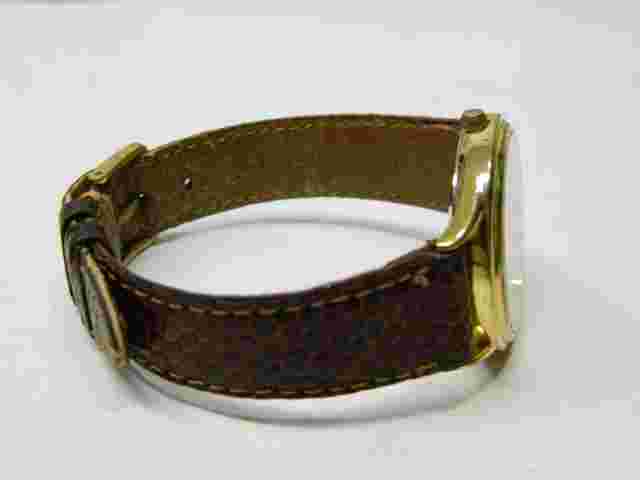 Gold tone Face brown leather band PEUGEOT Lady's wristwatch/watch