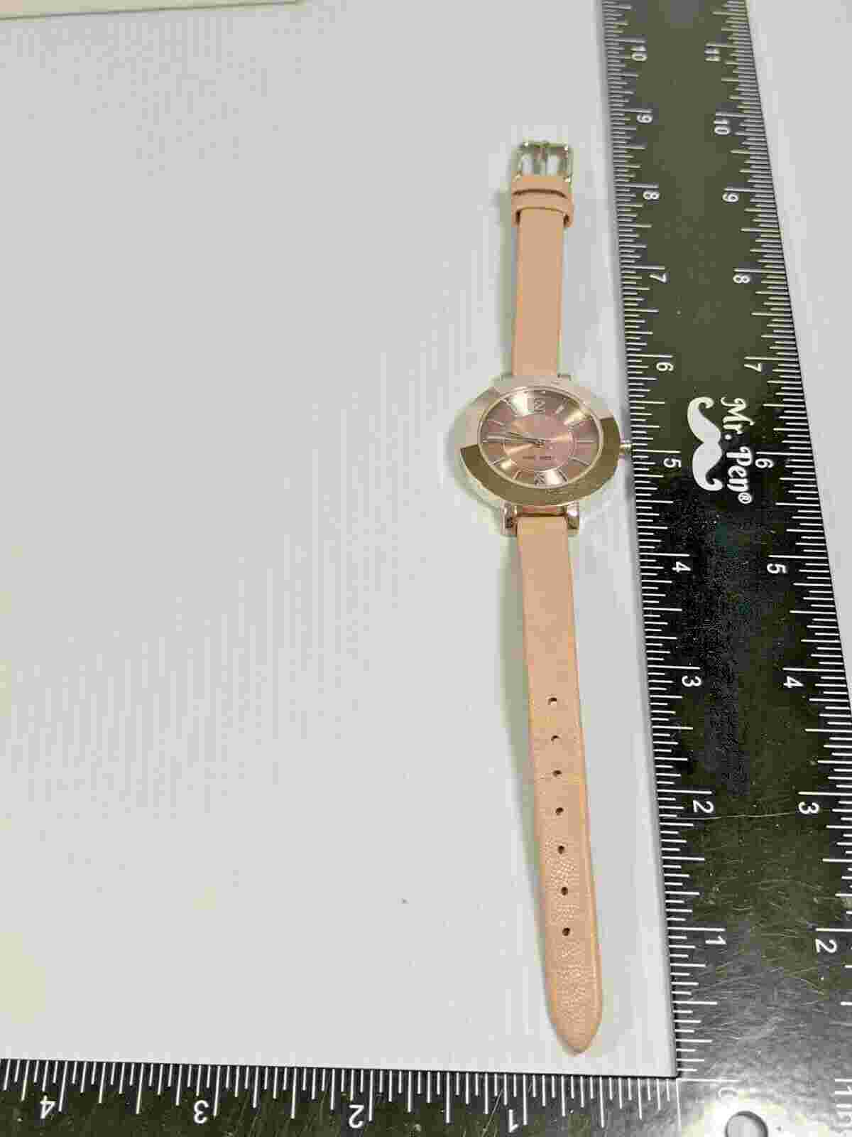 Woman's Silver Tone Pink Band Nine West Watch
