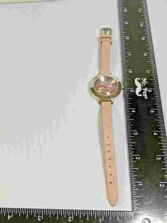 Woman's Silver Tone Pink Band Nine West Watch