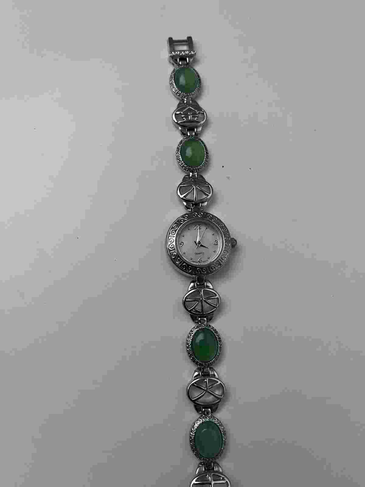 vintage AVON Silver tone watch with green jade beads and a white face