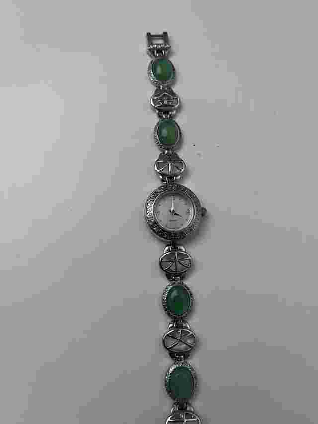 vintage AVON Silver tone watch with green jade beads and a white face