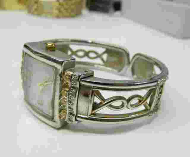 Beautiful silver tone cuff/Bangle style lady's watch/wristwatch