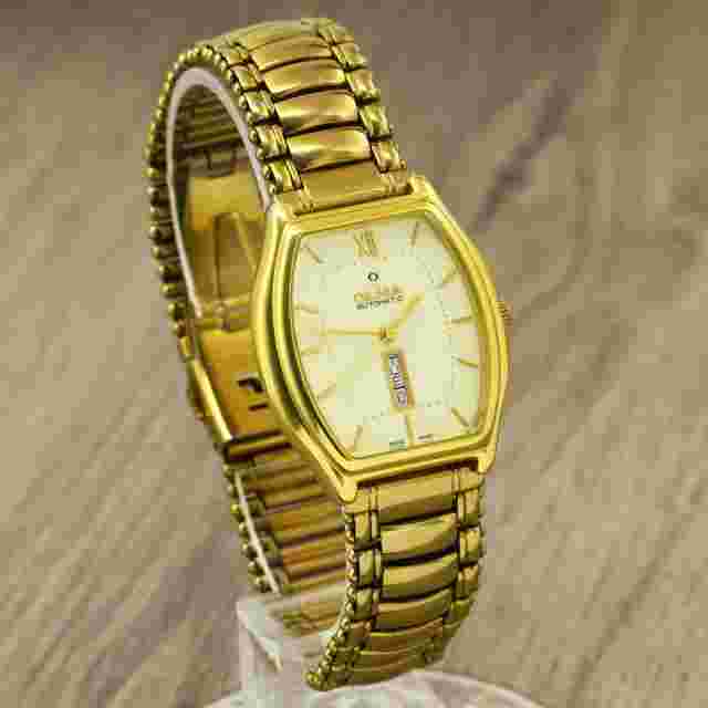 Olma 2688.001.30 Swiss made gold plated automatic wristwatch ETA 2688 day date