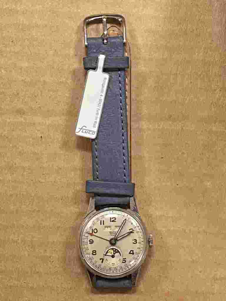 VINTAGE BRITIX TRIPLE CALENDAR MOON PHASE 31mm MANUAL WIND WATCH.
