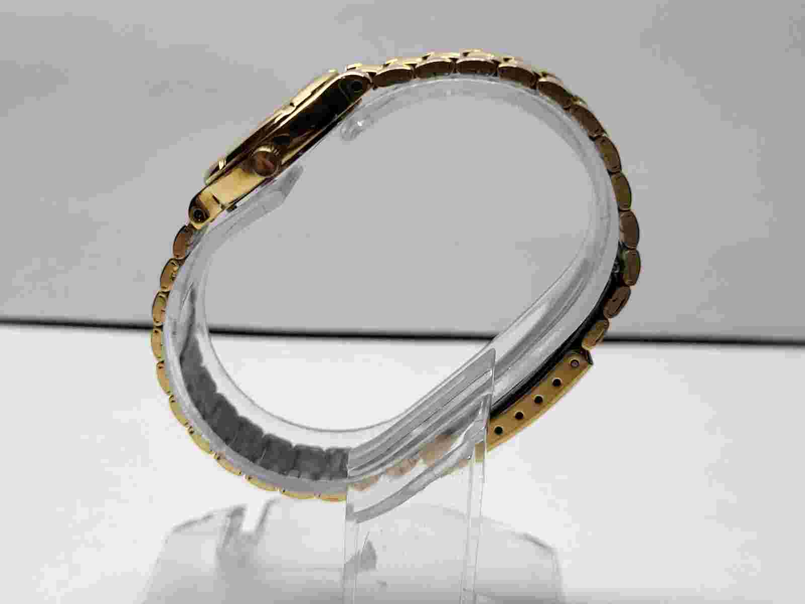 Halston Gold Tone Diamond Womans Wrist Watch 6.25"