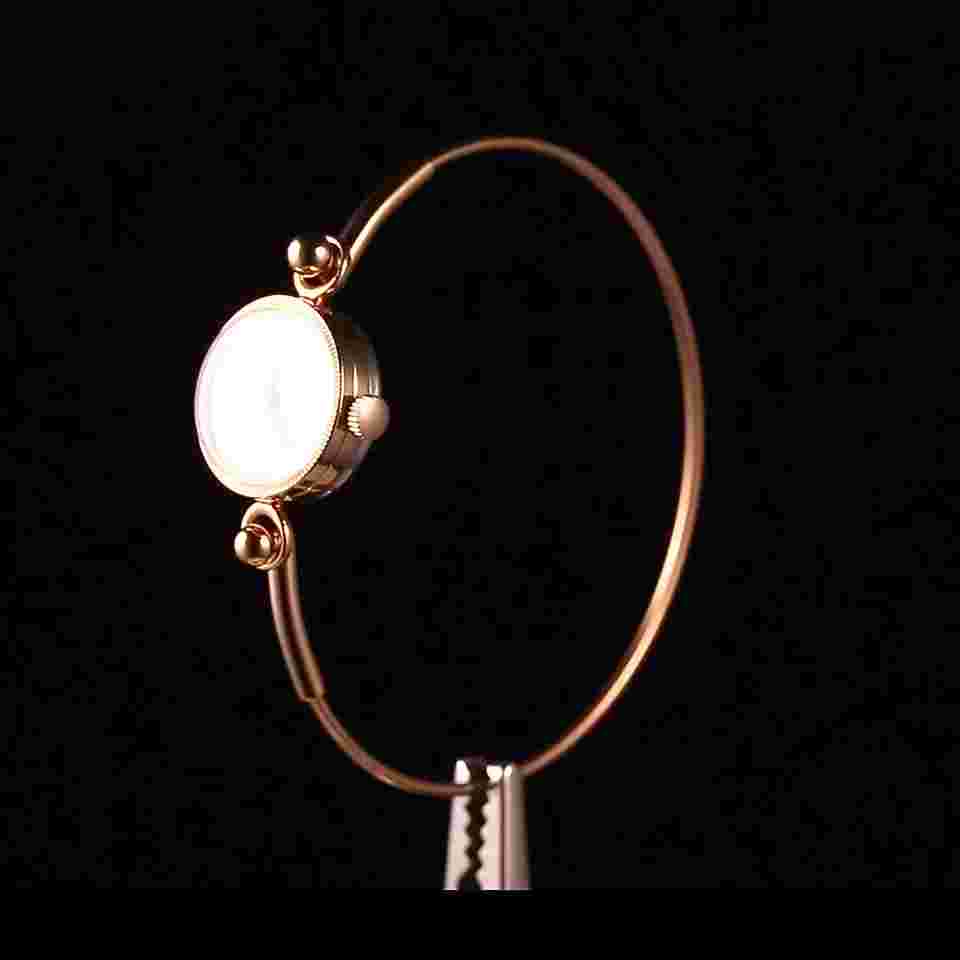 Vintage small cocktail gold-plated women's mechanical wristwatch. Chaika watch