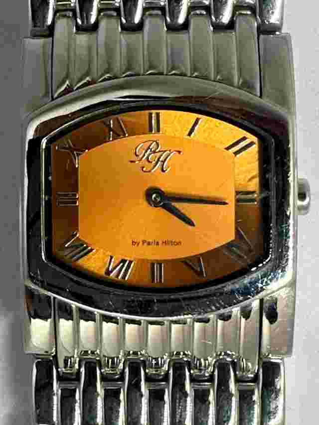 Paris Hilton Watch Women 11276M New Battery Silver Tone 29MM Orange Dial Z
