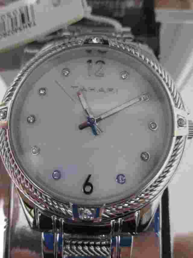 Tahari Wristwatch  Silver Stainless Steel Strap w/white mother of pearl dial
