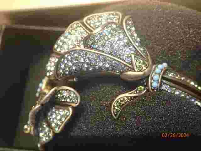 HEIDI DAUS! Gold Tone Green Fantasy Rhinestone Bypass Watch