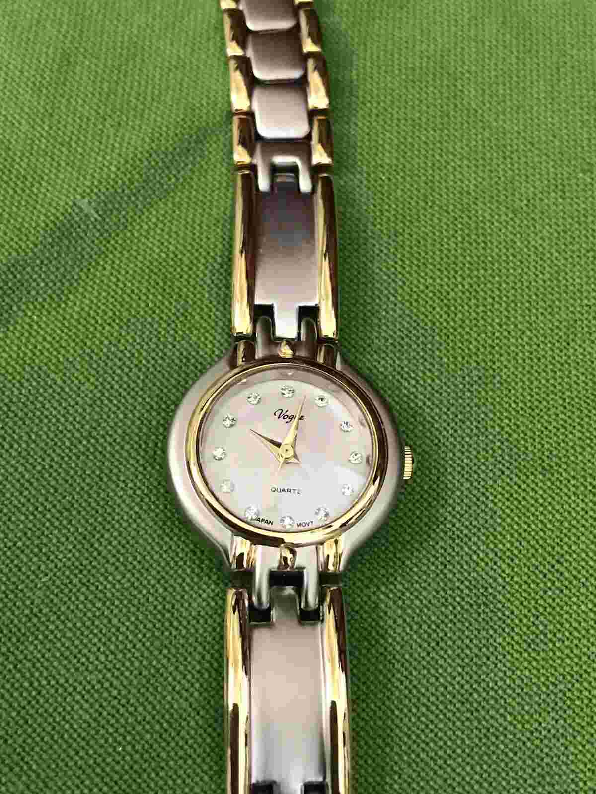 Vogue Women's Two Toned Bracelet Band Analog Watch.