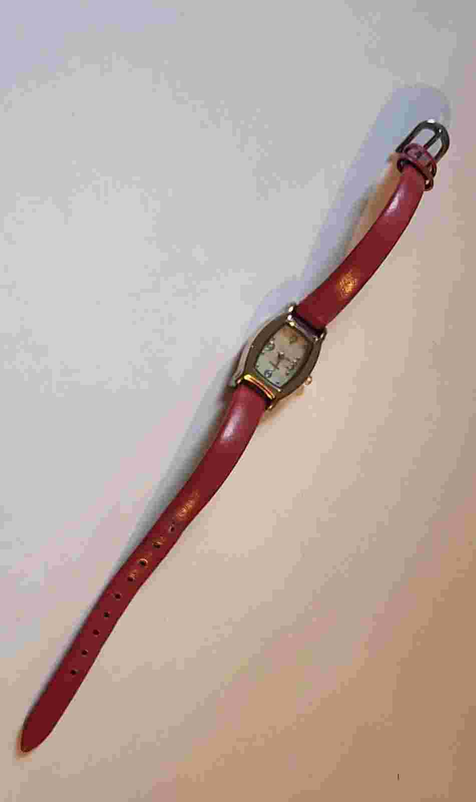 Avon Diamond Accent Watch With Mother of Pearl Dial Red