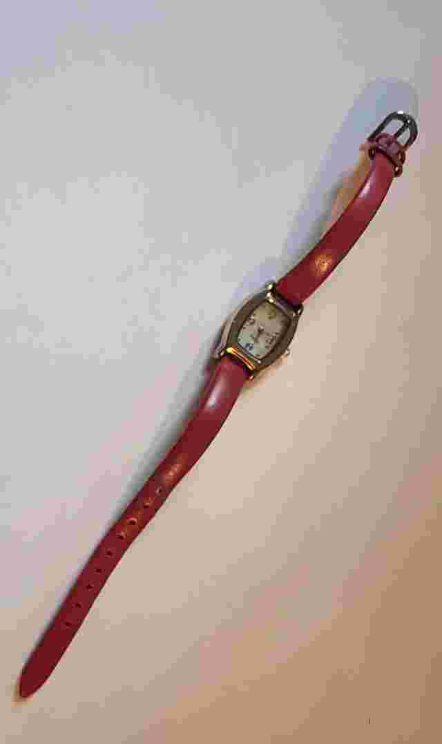 Avon Diamond Accent Watch With Mother of Pearl Dial Red