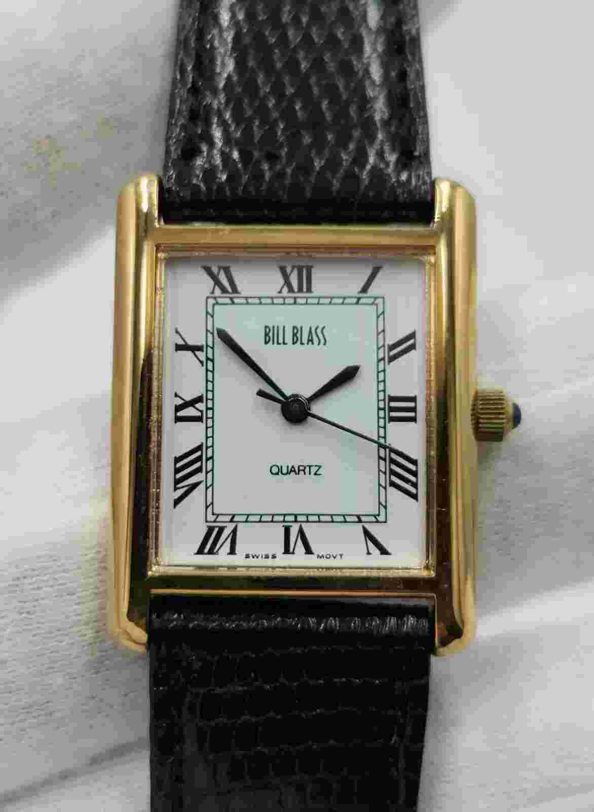 Bill Blass "Tank" Ladies Gold Tone w/ White Dial & Roman Numerals Quartz Watch