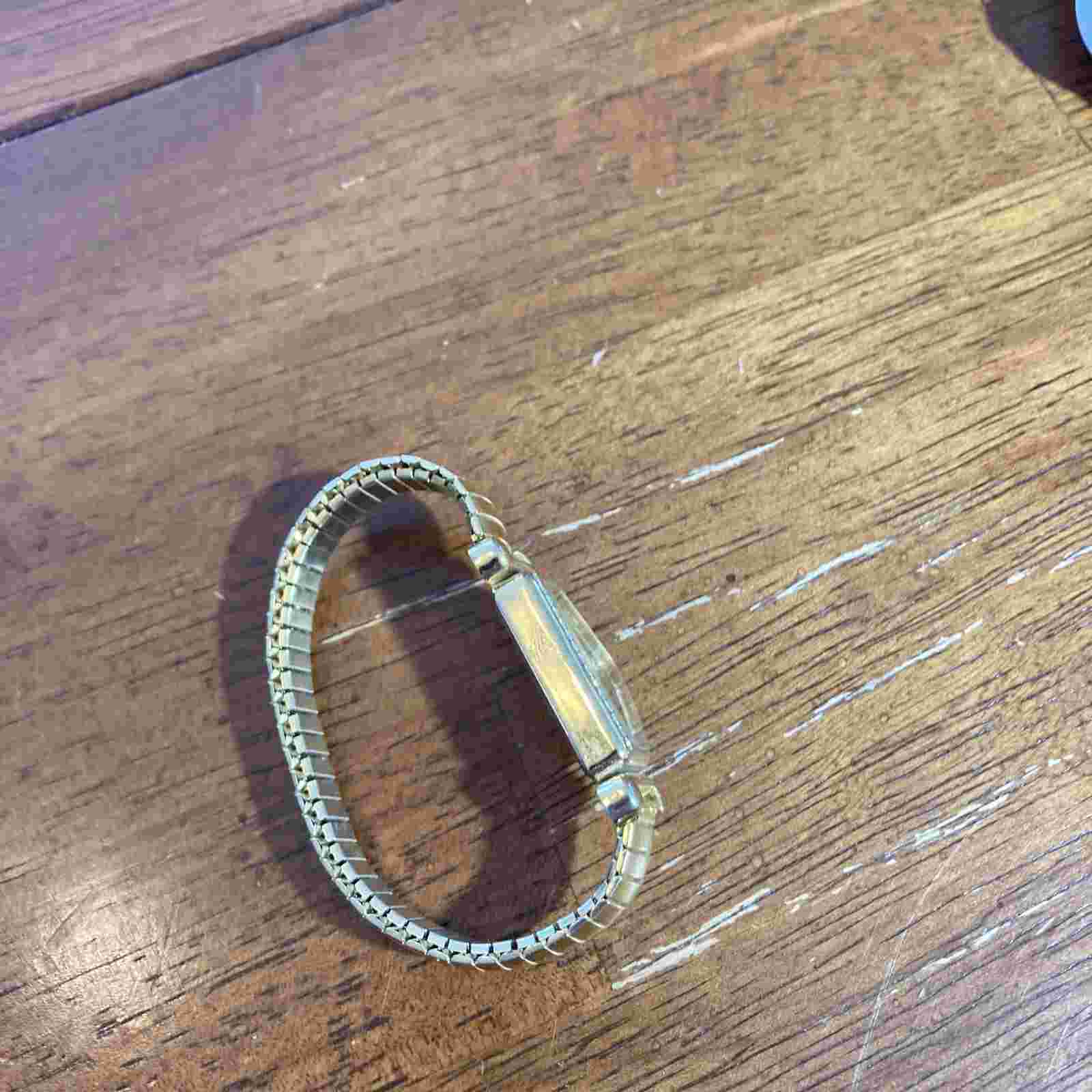 Vintage LA Express Watch Women Gold Tone Unique Crescent Shaped Dial Works