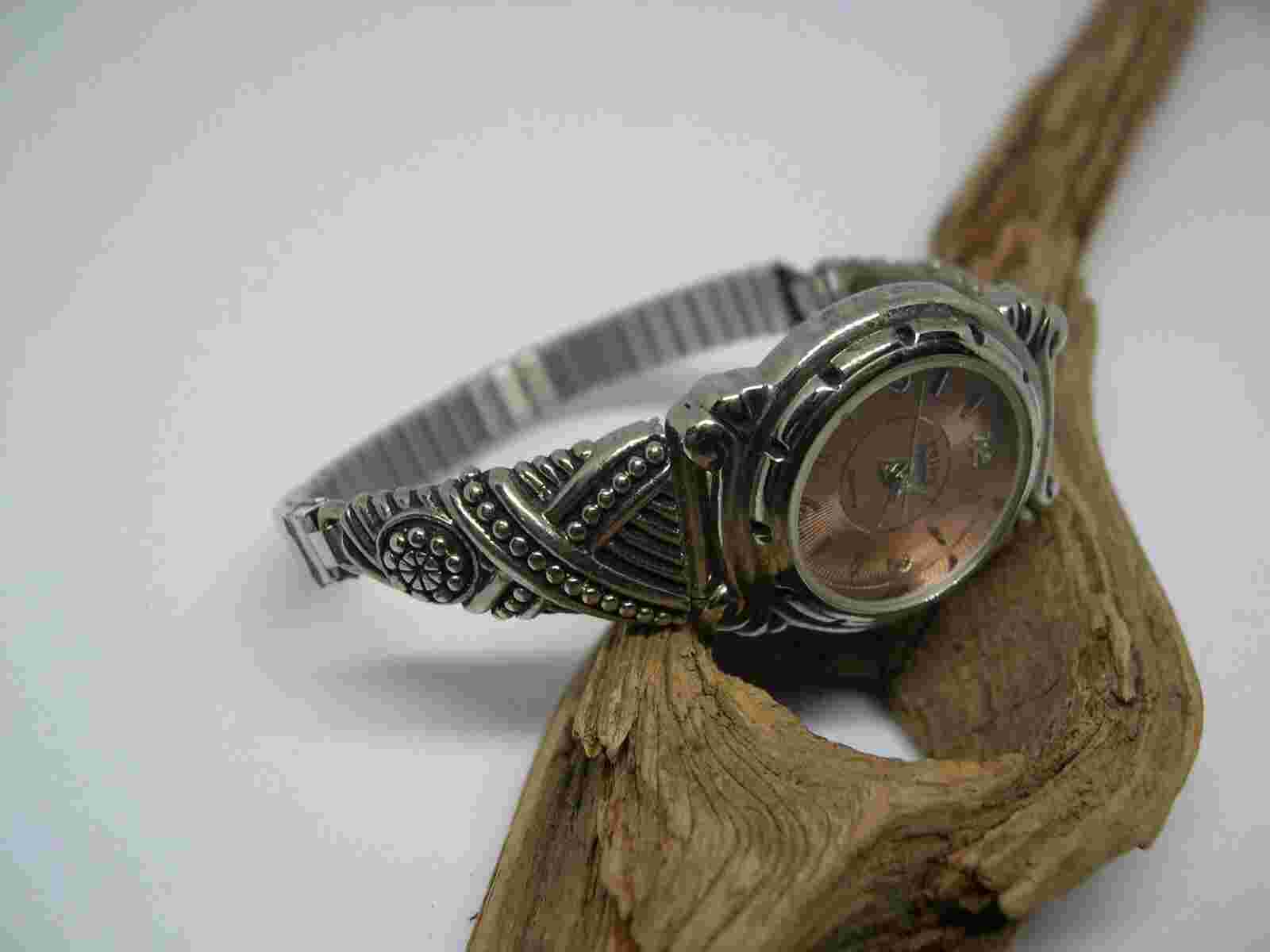 L77, KATHY IRELAND Ladies Copper Faced Watch, Silver Tone Half Flex Band, #1513