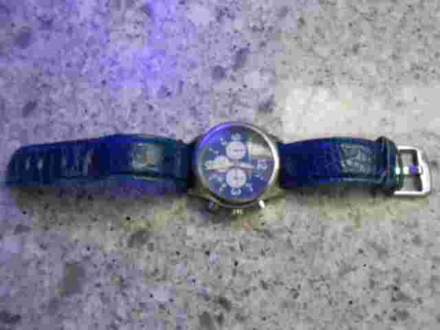 Dooney Bourke womens blue dial watch " With Case"