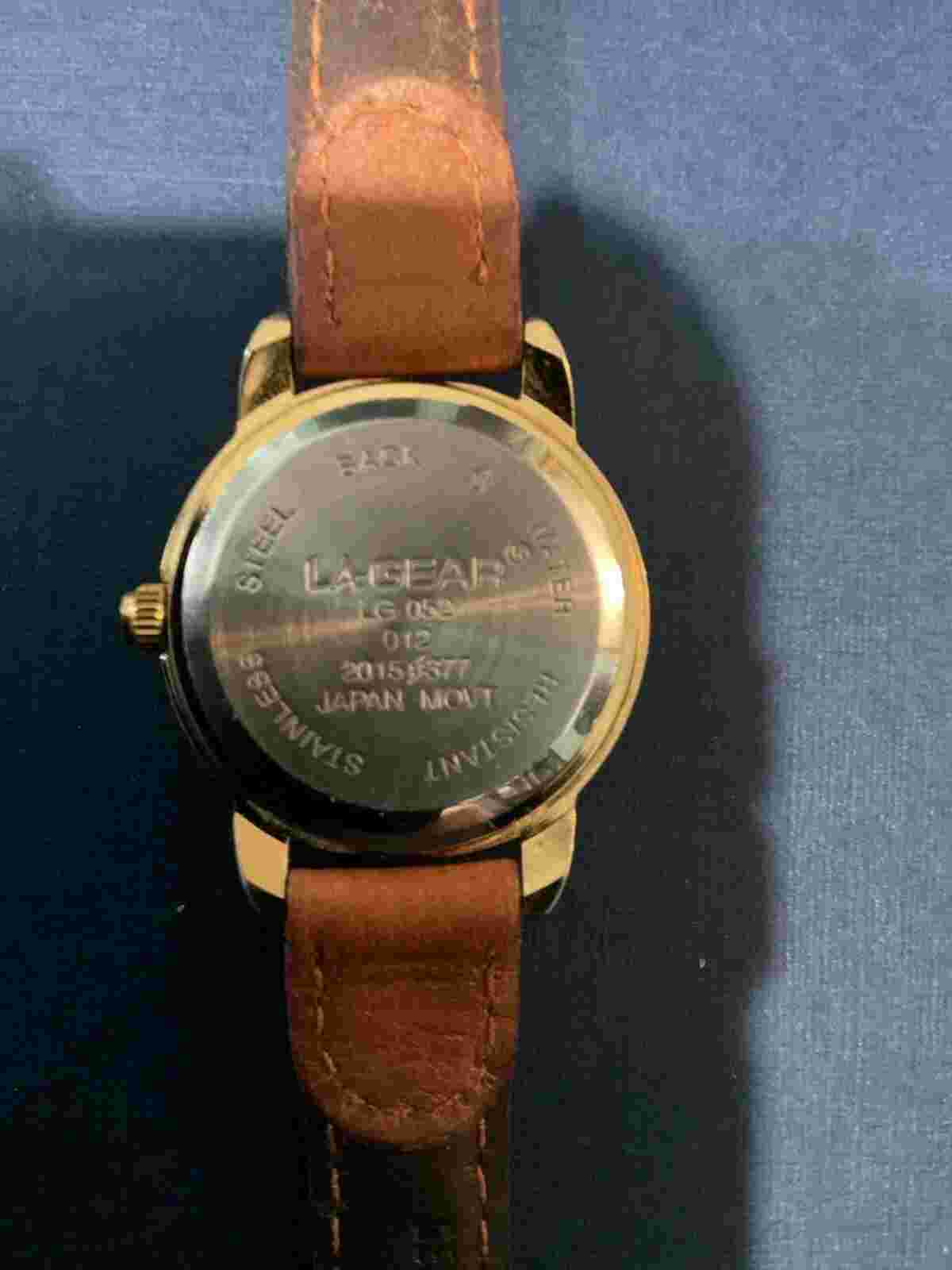 LA GEAR Ladies Watch gold tone with brown leather band . this is a used watch .