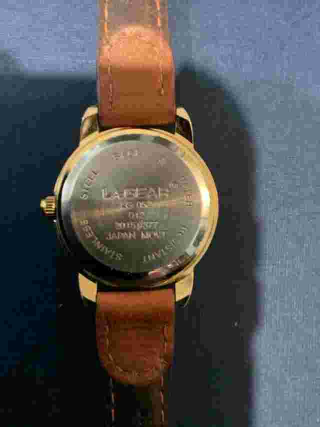 LA GEAR Ladies Watch gold tone with brown leather band . this is a used watch .