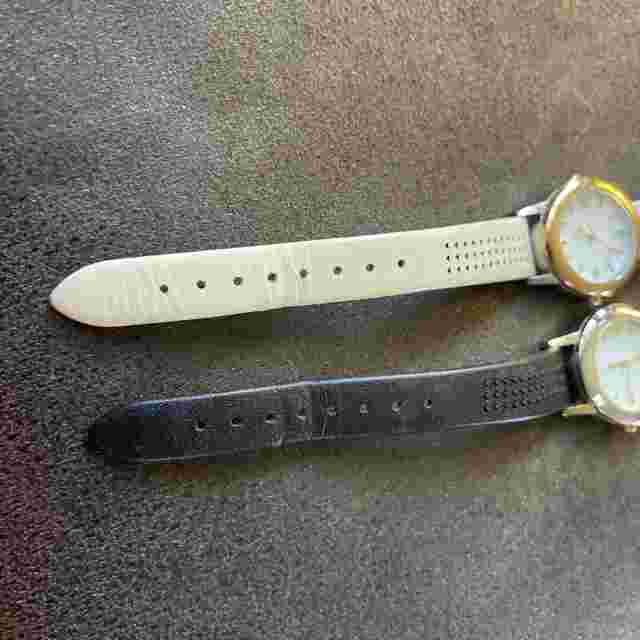 Pair of ladies watches by Stella and dot beige and black leather strap  Stainles