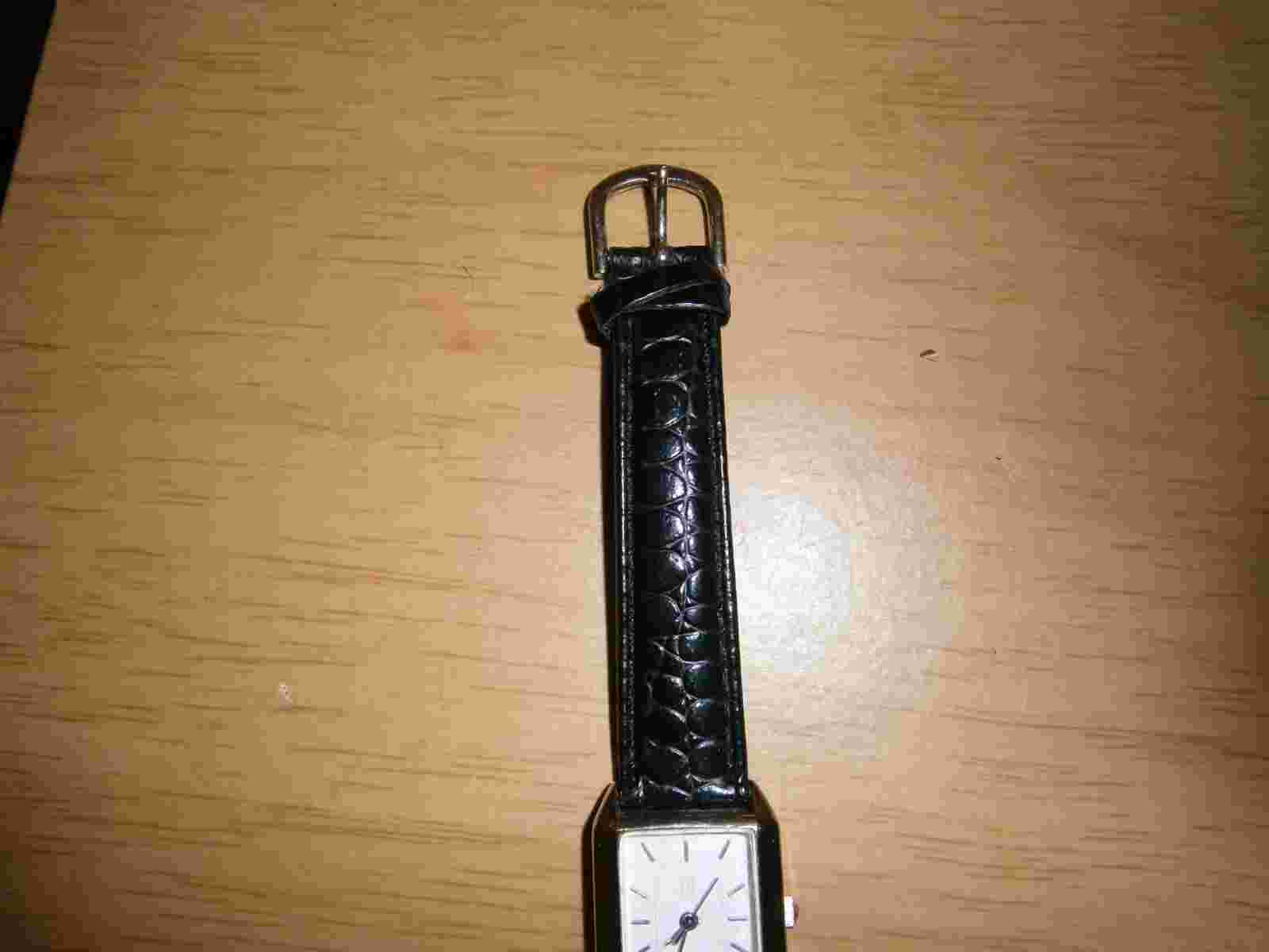 Black leather womens quartz River Island watch. 20cm's. (D39)